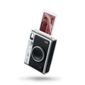 Cámara instantánea híbrida INSTAX Mini EVO negra con pantalla LCD, carga USB-C y múltiples efectos de lente