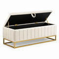 Banco de almacenamiento, tela beige, estructura de acero dorado, 120 cm