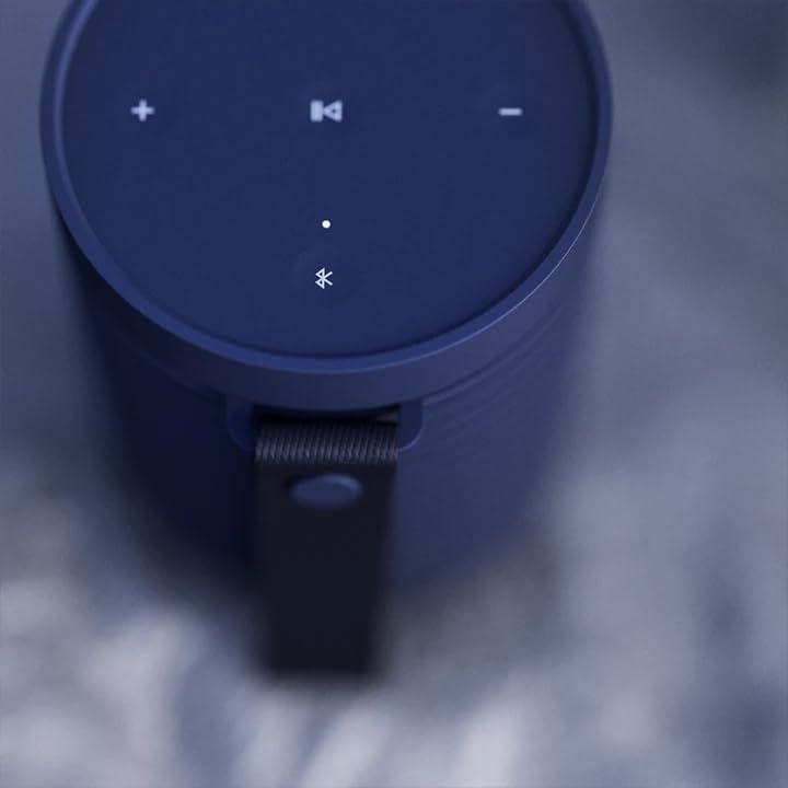 Bang & Olufsen Beosound Explore – Altavoz Bluetooth inalámbrico portátil para exteriores, hogar y viajes, 27 horas de autonomía, resistente al agua, sonido 360° + cable de carga USB-C – Negro antracita