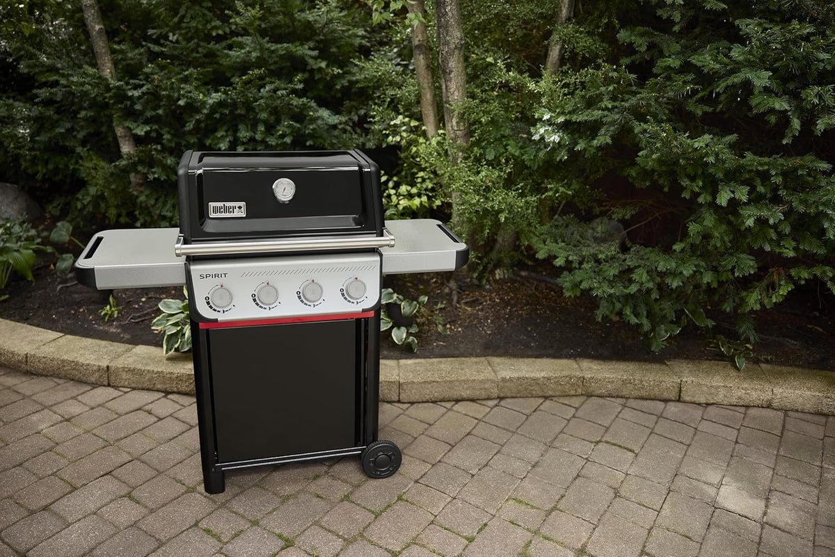 Barbacoa de gas Weber Spirit E-410 / 4 quemadores, encendido piezoeléctrico, ruedas robustas y rejilla de calentamiento, superficie de cocción de 51 x 46 cm, compatible con mesas laterales Weber Works, negro/plata