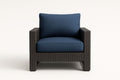 Sillón de exterior de ratán sintético negro con cojines azules