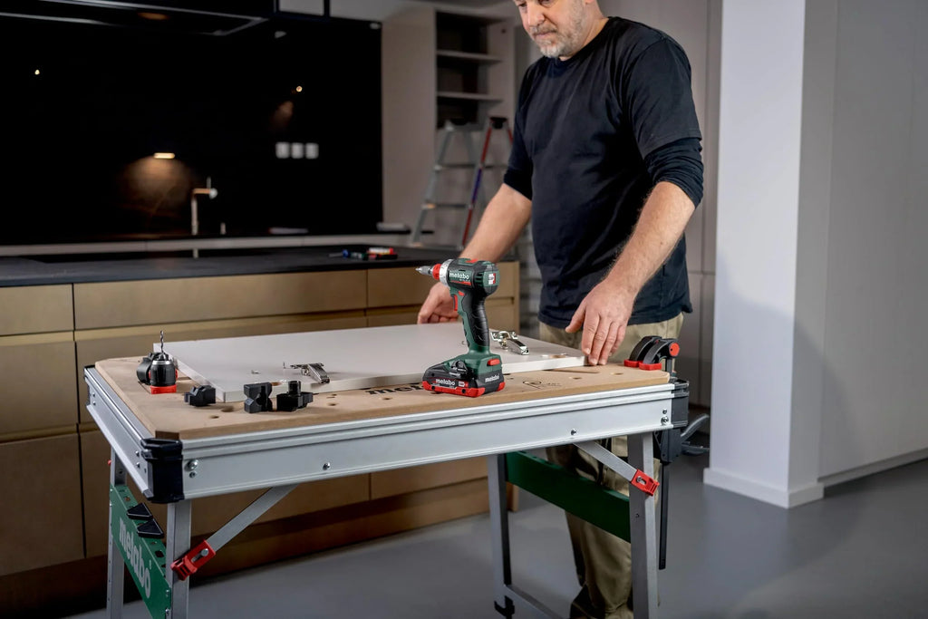 Mesa multifunción Metabo MWB 100, banco de trabajo plegable, caballete móvil, 120 kg, incl. 2 sargentos y 4 topes de banco