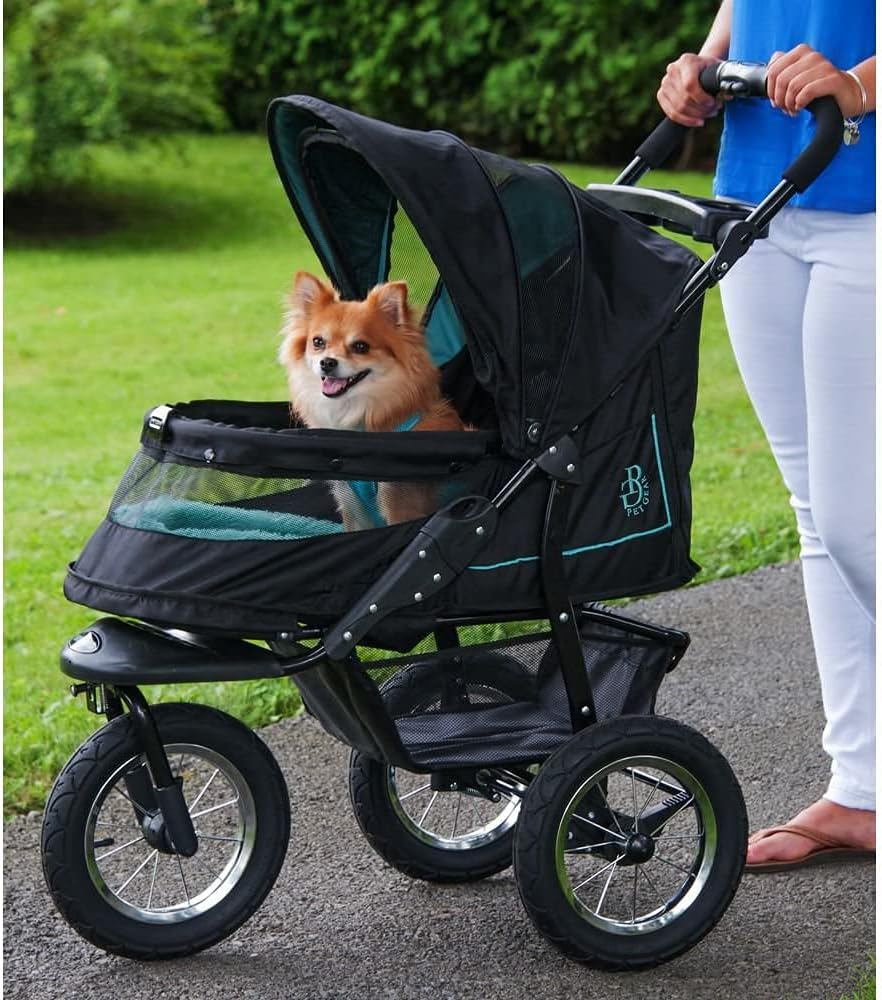 Cochecito para mascotas No-Zip NV para gatos/perros, entrada sin cremallera, plegado fácil con una sola mano, ruedas con relleno de gel, cojín de felpa + protector contra la intemperie incluidos, 3 colores
