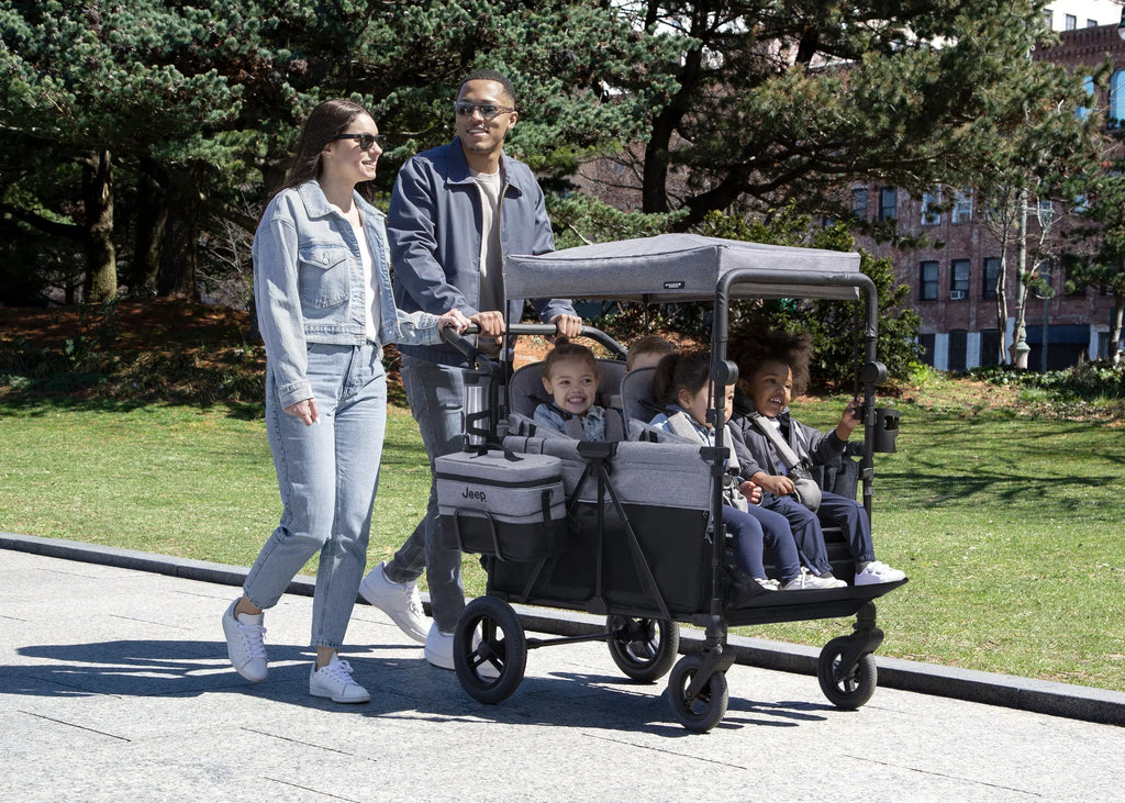 Jeep Wrangler Deluxe Stroller Wagon for 4 Kids – Removable Canopy, Cooler Bag, Modular Seats, XXL Storage, All-Terrain Tires, Adjustable Handlebars
