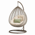 Sillón colgante de metal beige con cojín