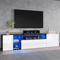 Mueble de TV Merax con LED, mueble para televisión de alto brillo con 2 puertas y 2 cajones, soporte para televisores de hasta 75 pulgadas, mueble bajo para salón, dormitorio, comedor, 180 cm, blanco y negro