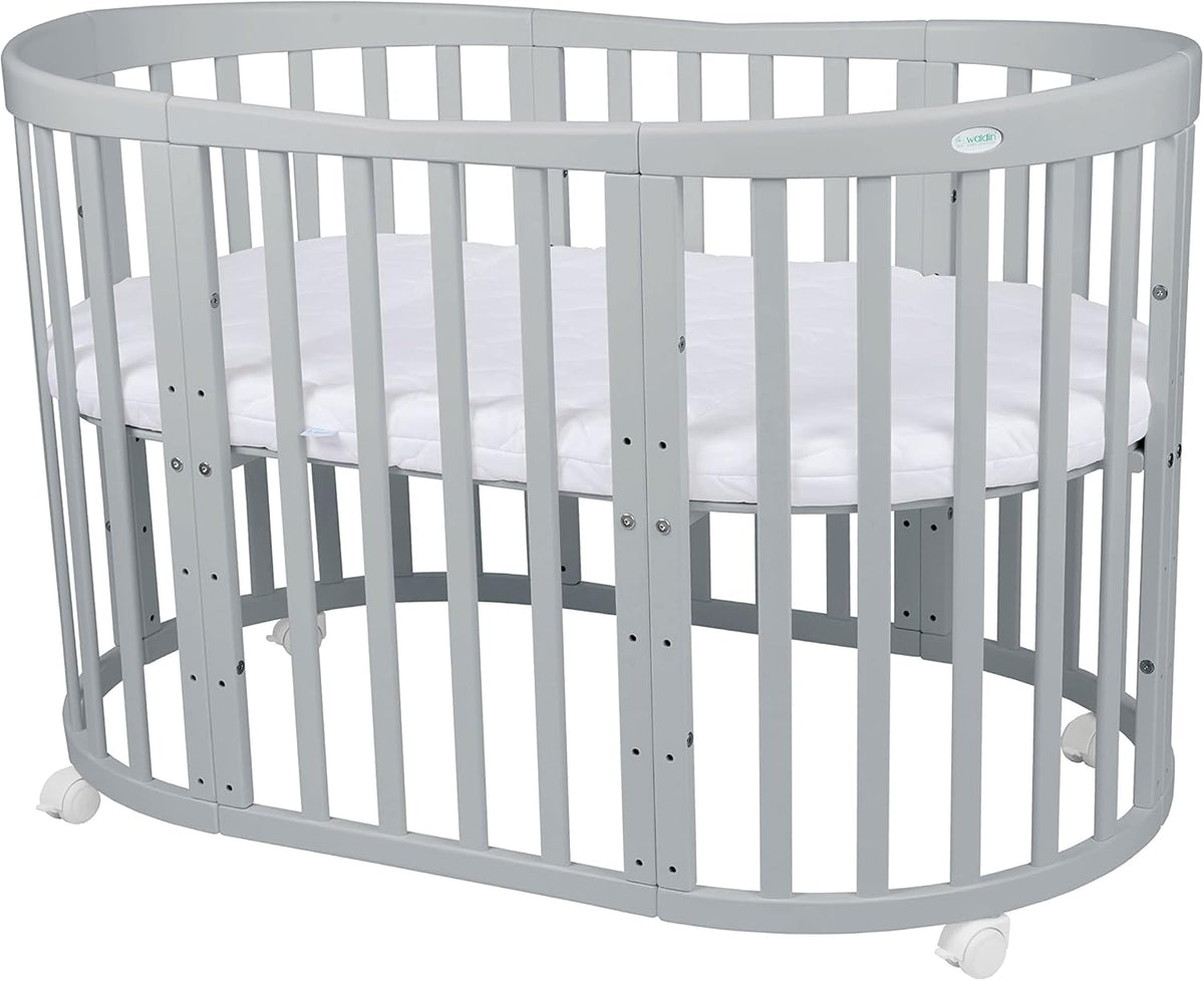 Cuna ovalada evolutiva Waldin, set completo 7 en 1, cuna de barrotes, cama infantil con colchón, cambiador, cuna colecho, madera blanca