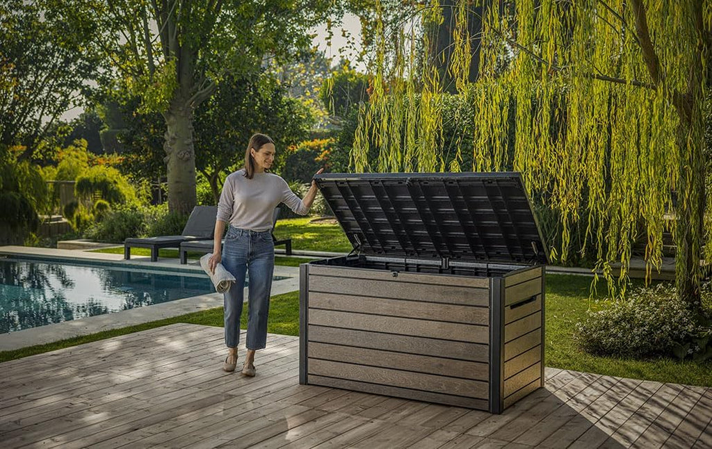 Arcón de almacenamiento Keter Signature 870L nogal - Caja de jardín con aspecto de madera y función de asiento - Baúl para cojines resistente a la intemperie con pistones de gas