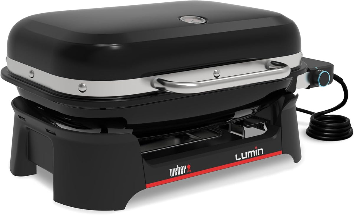 Barbacoa eléctrica Weber Lumin, hasta 315 °C, con termómetro en la tapa, rejillas de hierro fundido vitrificado, superficie de cocción de 33 x 49 cm, negro (1502045)