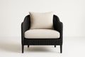 Sillón de polietileno negro con cojín beige