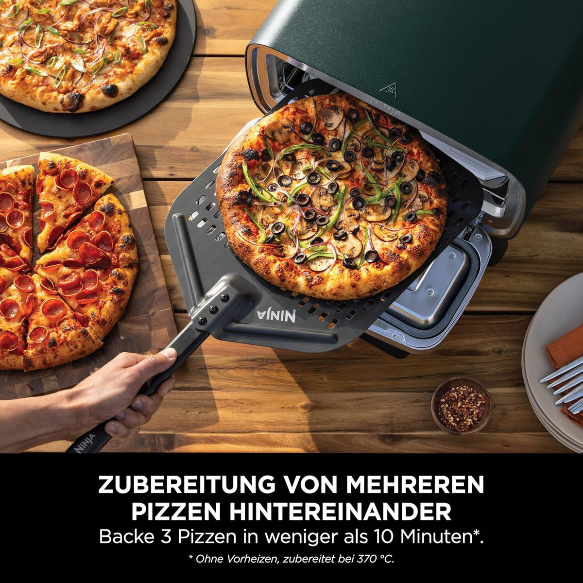 Horno de pizza para exteriores y freidora de aire Ninja Artisan, 4 funciones, tabla de servir, cortador de pizza, piedra para pizza de 30 cm, pala para pizza, bandeja para hornear y cesta para freidora de aire, verde MO201AMZEU