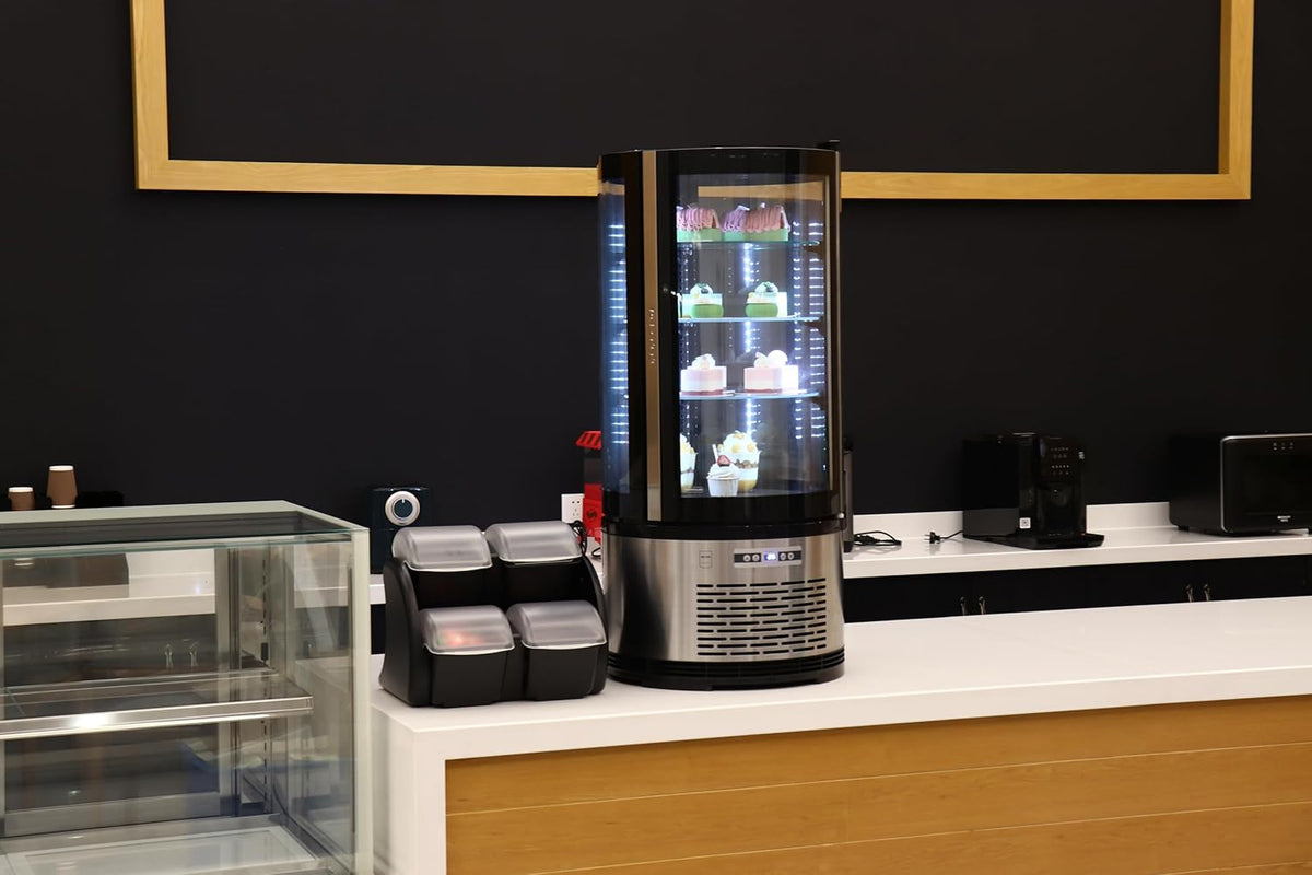 Vitrina refrigerada METRO Professional GRV1100, para hostelería, acero inoxidable/vidrio, 100 L, refrigeración por aire forzado, 490 W, indicador de temperatura,  descongelación automática, redonda, plateada, clase climática 6