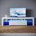 Mueble de TV moderno SONNI de 180 cm, mueble bajo en blanco brillante con iluminación LED de 16 colores, cajón, estantes de cristal abiertos, mesa de TV para televisores de hasta 65 pulgadas para salón y dormitorio, 180x35x45 cm.