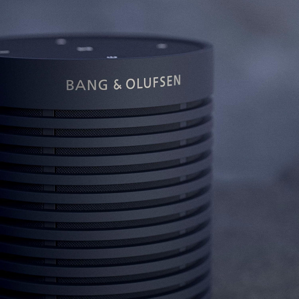 Bang & Olufsen Beosound Explore – Altavoz Bluetooth inalámbrico portátil para exteriores, hogar y viajes, 27 horas de autonomía, resistente al agua, sonido 360° + cable de carga USB-C – Negro antracita